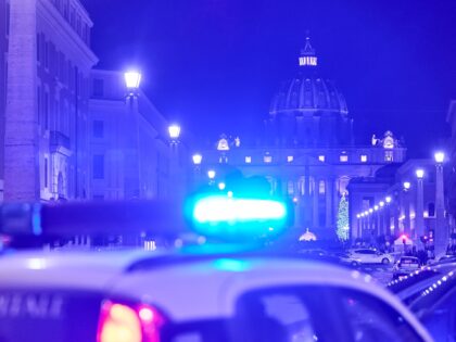 ROME, ITALY - DECEMBER 29: A night view of St. Peter's Basilica with the lights of a local police vehicle in Vatican City on December 29, 2022 in Rome, Italy. (Photo by Emmanuele Ciancaglini/Ciancaphoto Studio/Getty Images)