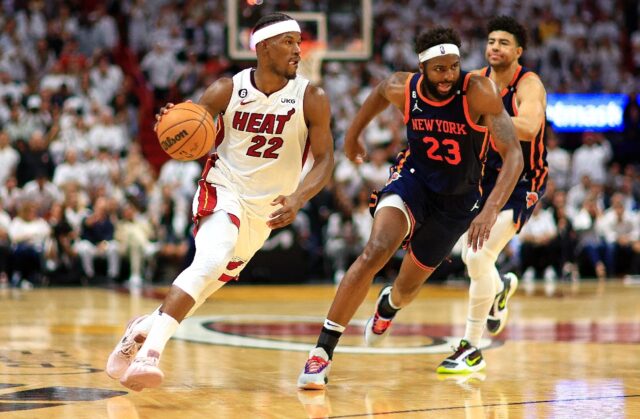 Miami's Jimmy Butler drives on Mitchell Robinson in the Heat's series-clinching 96-92 vict