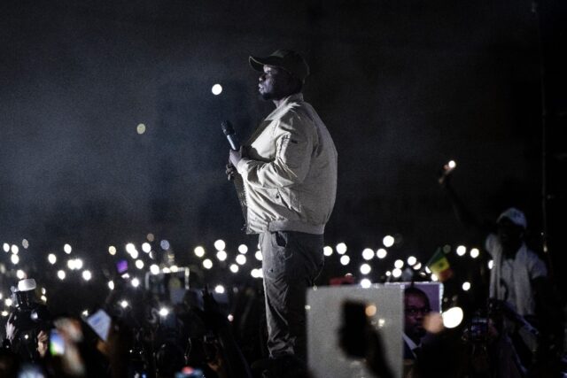 Opposition leader Ousmane Sonko addressing supporters at a rally in March