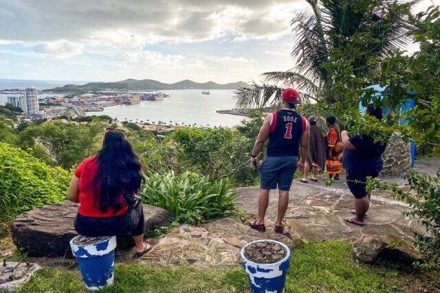 People look out toward the seafront from the Vierge du Pacifique in Noumea after an earthq