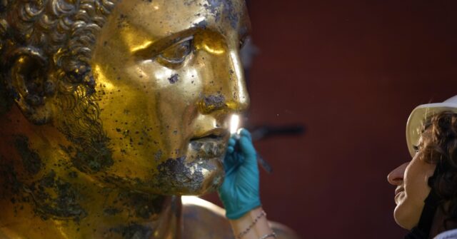 Vatican experts uncovering gilded glory of Hercules statue struck by lightning – Breitbart Vatican experts uncovering gilded glory of Hercules statue struck by lightning – Breitbart