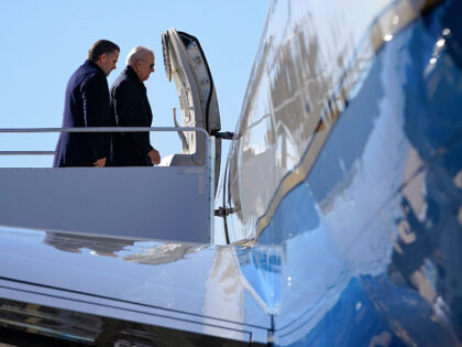 President Joe Biden and his son Hunter Biden board Air Force One, Saturday, Feb. 4, 2023,