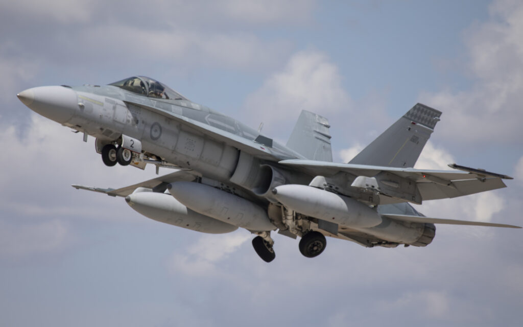 Royal Australian Air Force F/A-18A Hornet aircr4aft, A21-002, departs for the last time from RAAF Base Tindal, Northern Territory.