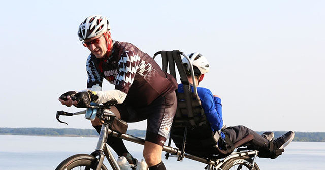 Man with Cerebral Palsy Trains for Ironman World Championship with Dad