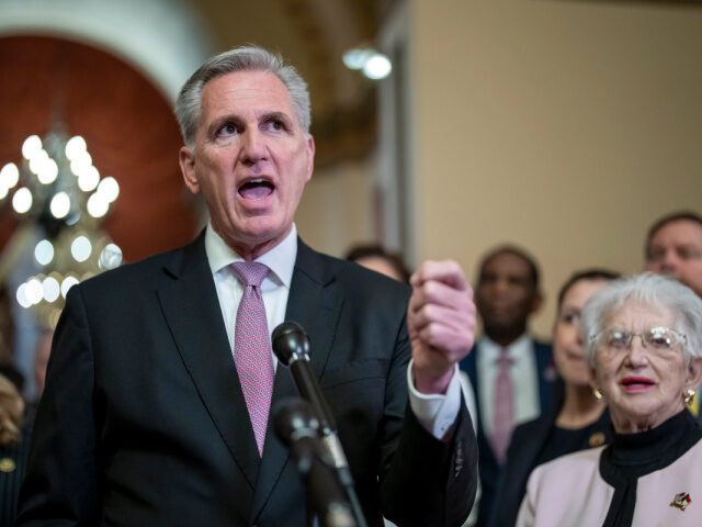 FILE - Speaker of the House Kevin McCarthy, R-Calif., joined at right by Rep. Virginia Fox