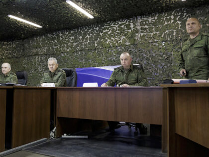 In this photo taken from video and distributed by Russian Defense Ministry Press Service on May 19, 2023, Russian Defense Minister Sergei Shoigu, second left, attends a meeting with officers as he inspects a command post of one of the formations of the Vostok group of Russian troops in the …