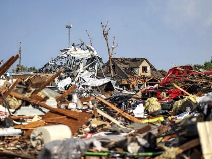 Debris covers a residential area in Perryton, Texas, Thursday, June 15, 2023, after a tornado struck the town. (AP Photo/David Erickson)