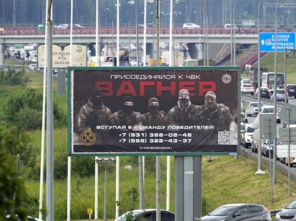 A billboard reading "Join us at Wagner", which is associated with the Wagner private military group and contractor Yevgeny Prigozhin, is seen above a highway on the outskirts of St. Petersburg, Russia, Saturday, June 24, 2023. Russia's security services have responded to mercenary chief Prigozhin's declaration of an armed rebellion …