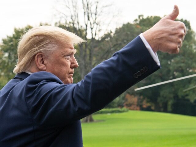 US President Donald Trump gives the thumbs up before departing the White House in Washingt