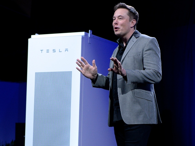 Elon Musk with Tesla Powerwall