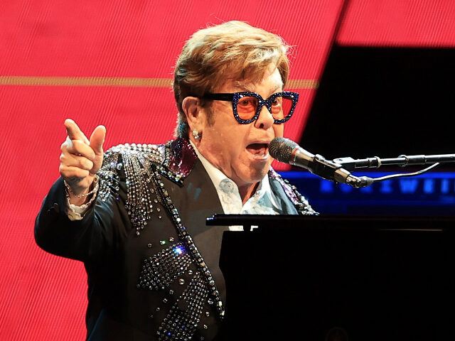 LIVERPOOL, ENGLAND - MARCH 23: (EDITORIAL USE ONLY) Elton John performs during the first U