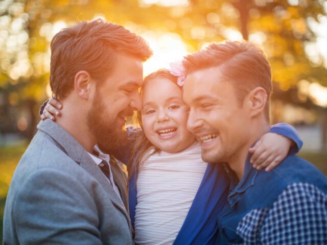 Gay couple with child (Getty)