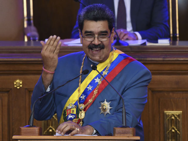 Nicolas Maduro, Venezuela's president, laugh as he delivers a State of the Union address a