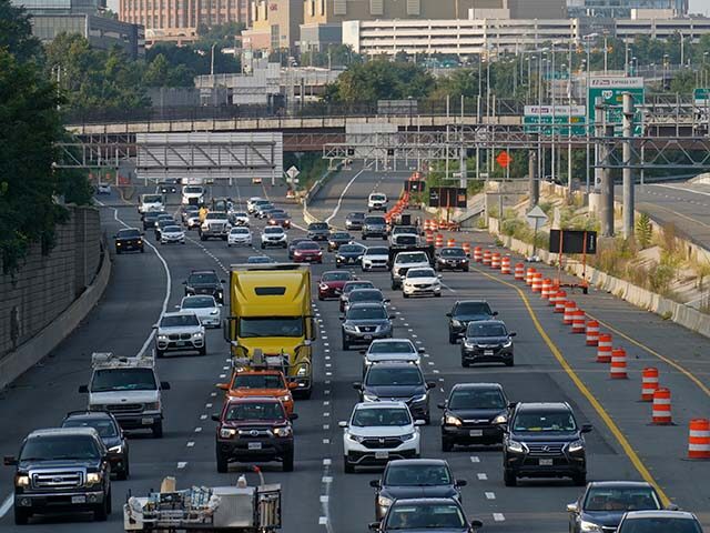 Commuters drive on the beltway as heavy rush hour traffic volume rebounds from the empty r