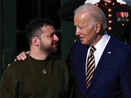 TOPSHOT - US President Joe Biden welcomes Ukraine's President Volodymyr Zelensky on the South Lawn of the White House in Washington, DC, on December 21, 2022. - Zelensky is in Washington to meet with US President Joe Biden and address Congress -- his first trip abroad since Russia invaded in …