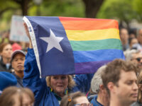 AUSTIN, TX - MARCH 20: Supporters of trans rights rally on the steps of the Texas Capitol ahead of an advocacy day of meetings with state representatives. Amber Briggle, husband Adam, their son and daughter drove more than 200 miles from their home to attend a rally and trans awareness day at the Texas Capitol in Austin, Texas on March 20, 2023. The Briggles are one of the families in Texas that were investigated by Child Protective Services for the gender-affirming care they provide for their son Grayson. Texas Attorney General Ken Paxton (R) wrote a legal opinion in 2022 that characterizing gender-affirming treatments for transgender children, including puberty-blocking medications, can legally constitute child abuse. (Photo by Julia Robinson for The Washington Post via Getty)