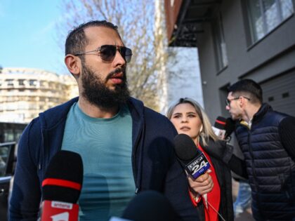 Controversial influencer Andrew Tate arrives at the Directorate for the Investigation of Organized Crime and Terrorism (DIICOT) to attend a hearing on April 10, 2023. - Andrew Tate and his brother Tristan were released after three months of pre-trial detention in Romania and moved to house arrest while they continue …