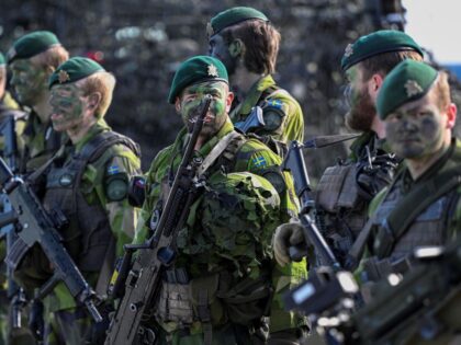 Swedish soldiers are seen during the Aurora 23 joint military exercise of Swedish amphibious soldiers and Finnish amphibious soldiers from the Nylands brigade at Berga naval base outside Stockholm on April 28, 2023. (Photo by Anders WIKLUND / TT News Agency / AFP) / Sweden OUT (Photo by ANDERS WIKLUND/TT …