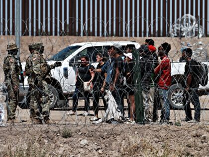 CIUDAD JUAREZ , MEXICO - MAY 11: Military personnel are seen as migrants try to cross the United States border before the Title 42 policy, which allows for the immediate expulsion of irregular migrants entering the country, comes to an end, in Ciudad Juarez, Mexico on May 11, 2023. (Photo …