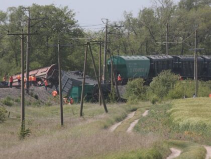 A view shows the site of a train derailment outside Simferopol on May 18, 2023. A train carrying grain has derailed in the Russian-annexed Crimean peninsula in what Moscow-installed officials on May 18, 2023 called a deliberate act. The railway operator said the incident was caused by "the intervention of …
