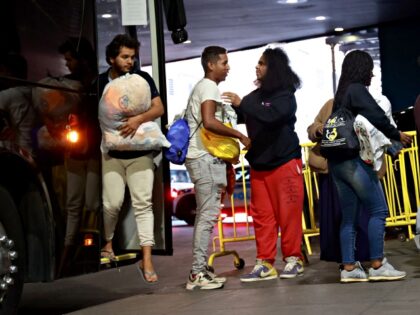 Migrants arrive from Texas at the Port Authority Bus Terminal on May 17, 2023, in New York. (Luiz C. Ribeiro/New York Daily News/Tribune News Service via Getty Images)