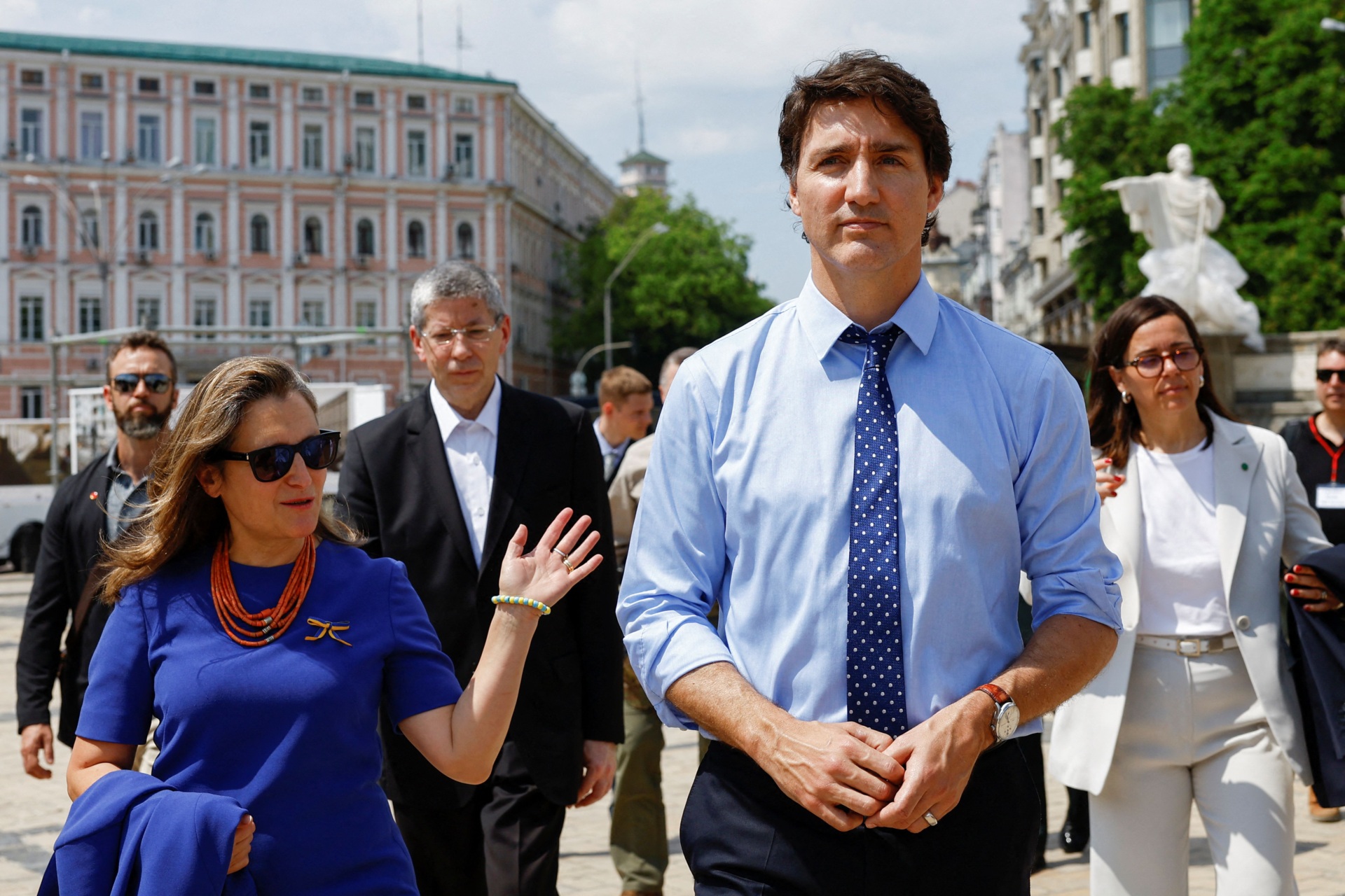 Canadian Prime Minister Justin Trudeau and Canada's Minister of Finance Chrystia Freeland (L) arrive to visit an exhibition of destroyed vehicles in Kyiv on June 10, 2023, amid Russia's invasion of Ukraine. (Photo by VALENTYN OGIRENKO / POOL / AFP) (Photo by VALENTYN OGIRENKO/POOL/AFP via Getty Images)