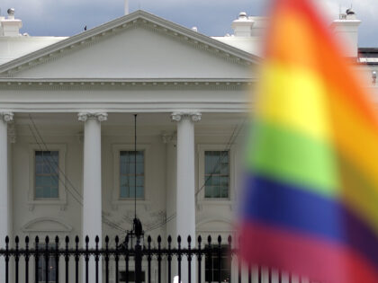 WASHINGTON, DC - JULY 04: A rainbow flag is seen outside the White House on Independence Day on July 4, 2021 in Washington, DC. President Joe Biden and First Lady Dr. Jill Biden will host about 1,000 guests, including COVID response essential workers and military families, to celebrate the nation’s …