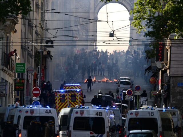 Protesters clash with CRS riot police at the Porte d'Aix in Marseille, southern Franc