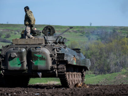 DONBAS REGION, UKRAINE - APRIL 26: Ukrainian armored vehicles maneuver and fire their 30mm guns, as Ukrainian Armed Forces brigades train for a critical and imminent spring counteroffensive against Russian troops, which invaded 14 months earlier, in the Donbas region, Ukraine, on April 26, 2023. Bolstered by billions of dollars …