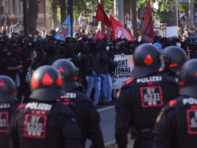 LEIPZIG, GERMANY - JUNE 03: Police in riot gear advance towards black bloc leftist demonst