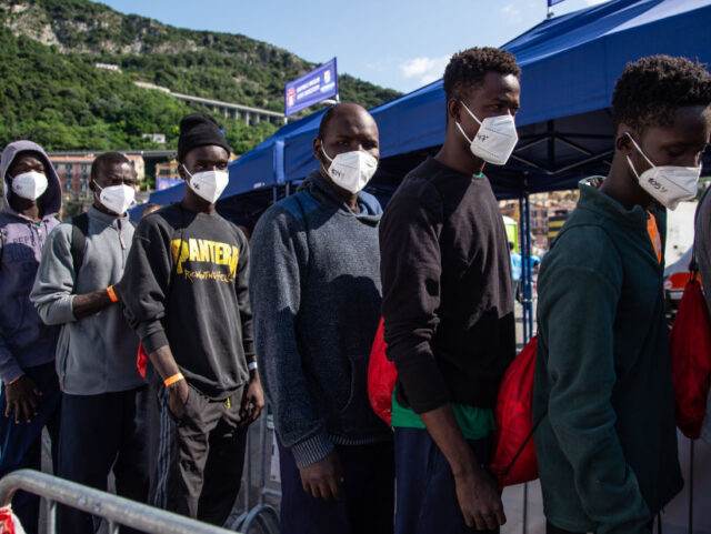 SALERNO, ITALY - JUNE 25: Migrants waiting after disembarking from the Aita Mari ship on J