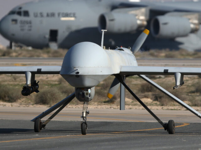 UNSPECIFIED, UNSPECIFIED - JANUARY 07: A U.S. Air Force MQ-1B Predator unmanned aerial vehicle (UAV), carrying a Hellfire air-to-surface missile lands at a secret air base in the Persian Gulf region on January 7, 2016. The U.S. military and coalition forces use the base, located in an undisclosed location, to …