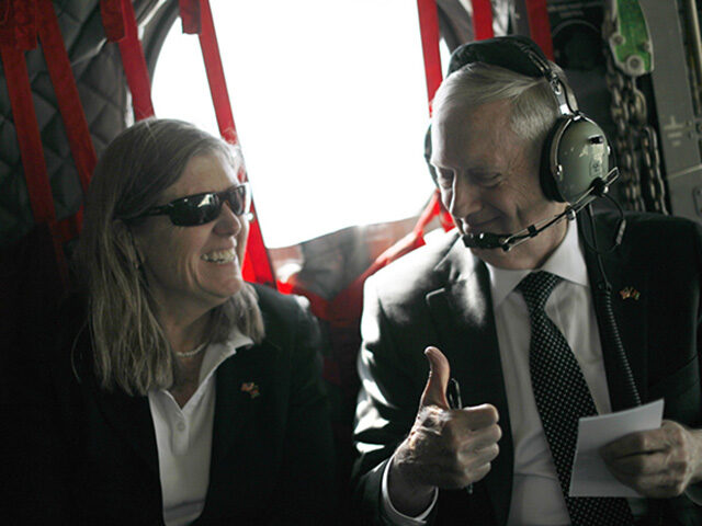 US Defence Secretary James Mattis (R) gestures to senior advisor Sally Donnelly as they arrive by helicopter at Resolute Support headquarters in the Afghan capital Kabul on April 24, 2017. US Defense Secretary Jim Mattis arrived in Afghanistan on an unannounced visit April 24, an American defence official confirmed, hours …