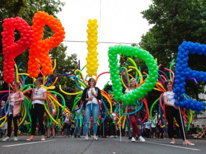 TOPSHOT - Participants of the 'Regenbogenparade' (Rainbow Parade) march in Vienna, Austria, are pictured on June 17, 2017. Lesbian, gay, bisexual, transgender and transsexual people attended the parade in the Austrian capital. / AFP PHOTO / ALEX HALADA (Photo credit should read ALEX HALADA/AFP via Getty Images)