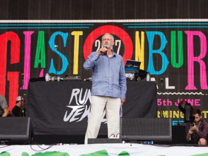 GLASTONBURY, ENGLAND - JUNE 24: Jeremy Corbyn speaks on stage on day 3 of the Glastonbury