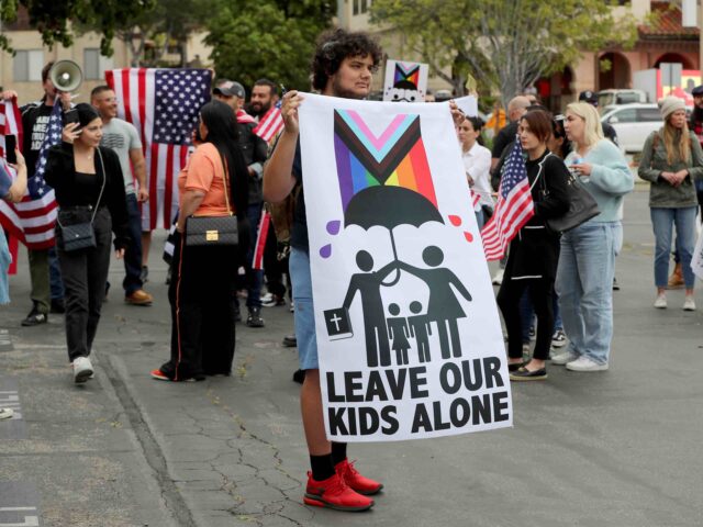 Burbank, CA - June 06: Protestors making their opinions known and join crowds gathering ou