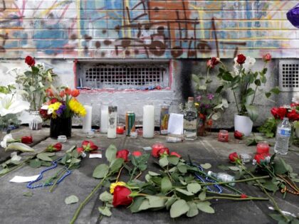 Flowers, candles, and other items are shown, Tuesday, June 30, 2020, at a growing memorial for a 16-year-old boy who was killed nearby in a fatal shooting Monday at the CHOP (Capitol Hill Occupied Protest) zone in Seattle. The area has been occupied by protesters since Seattle Police pulled back …
