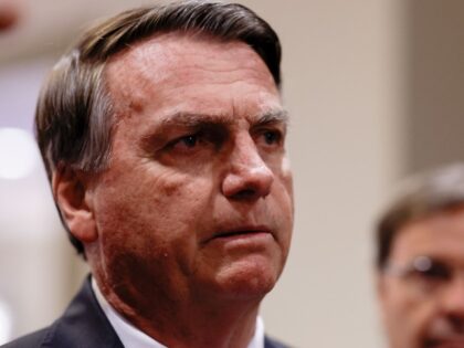 NATIONAL HARBOR, MARYLAND - MARCH 04: Former Brazilian President Jair Bolsonaro speaks to reporters as he arrives at the annual Conservative Political Action Conference (CPAC) at Gaylord National Resort & Convention Center on March 4, 2023 in National Harbor, Maryland. Former Brazilian President Jair Bolsonaro will address the event this …