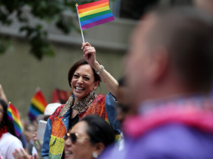 SAN FRANCISCO, CALIFORNIA - JUNE 30: Democratic presidential candidate U.S. Sen. Kamala Harris (D-CA) waves a pride flag as she rides in a car during the SF Pride Parade on June 30, 2019 in San Francisco, California. Sen. Harris spent the weekend in the San Francisco Bay Area where she …