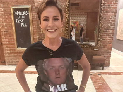 Exclusive – ‘WAR’: Kari Lake on Rocking Andrew Breitbart Shirt After Trump Indictment