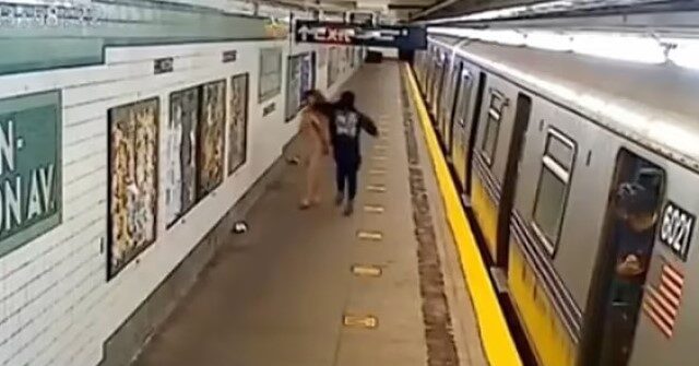 NextImg:Rotten Apple: Man Brutallly Punches Woman on NYC Subway Platform