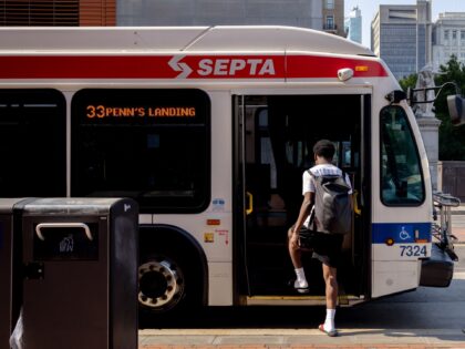A commuter boards a SEPTA bus in Philadelphia, Pennsylvania, U.S., on Friday, July 30, 202