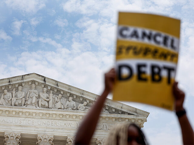 A Student debt relief activist protests outside the U.S. Supreme Court on June 30, 2023, in Washington, DC. The Supreme Court struck down the Biden administration’s student debt forgiveness program in a 6-3 decision. (Kevin Dietsch/Getty Images)