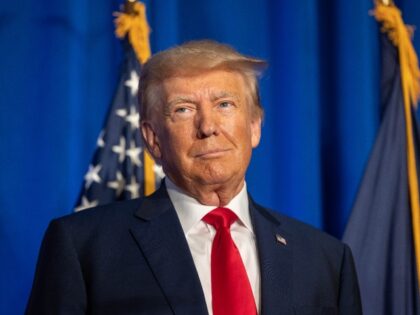 CONCORD, NEW HAMPSHIRE - JUNE 27: Republican presidential candidate, former U.S. President Donald Trump stands on stage after being introduced during the New Hampshire Federation of Republican Women's Lilac Luncheon on June 27, 2023 in Concord, New Hampshire. Republican presidential candidate, Florida Gov. Ron DeSantis is also holding a campaign …