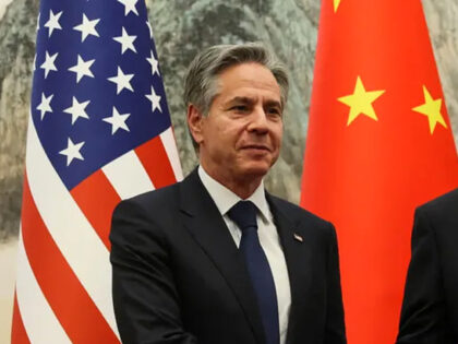 US Secretary of State Antony Blinken (L) and China's Foreign Minister Qin Gang shake hands