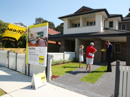 A property agent takes down prospective buyers' details during an open house inspection at a property in the suburb of Willoughby in Sydney, Australia, on Saturday, Oct. 19, 2013. Home prices across Australia's eight state and territory capitals climbed 6.8 percent in the nine months to Sept. 30, led by …