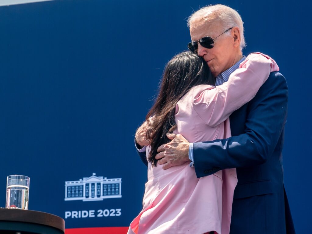 US President Joe Biden hugs an attendee during a Pride Month celebration event at the White House in Washington, DC, US, on Saturday, June 10, 2023. Biden praised the LGBTQ community's courage at what he described as the biggest Pride Month celebration yet at the White House, saying they're an example for the US and the world. Photographer: Nathan Howard/Bloomberg
