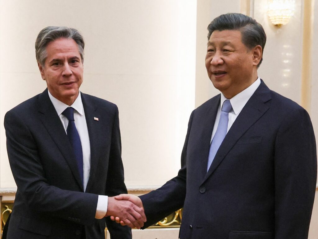 TOPSHOT -- U.S. Secretary of State Antony Blinken (L) shakes hands with Chinese President Xi Jinping at the Great Hall of the People in Beijing, June 19, 2023.  On June 19, President Xi Jinping hosted Antony Blinken for talks in Beijing that marked the conclusion of two days of high-level talks by the US Secretary of State with Chinese officials.  (Photo by Leah MILLIS/POOL/AFP) (Photo by LEAH MILLIS/POOL/AFP via Getty Images)