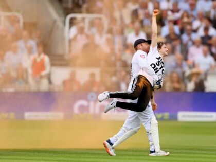 LONDON, ENGLAND - JUNE 28: Jonny Bairstow of England removes a "Just Stop Oil" pitch invad