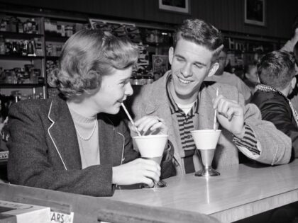 high school sweethearts at soda fountain 1950s